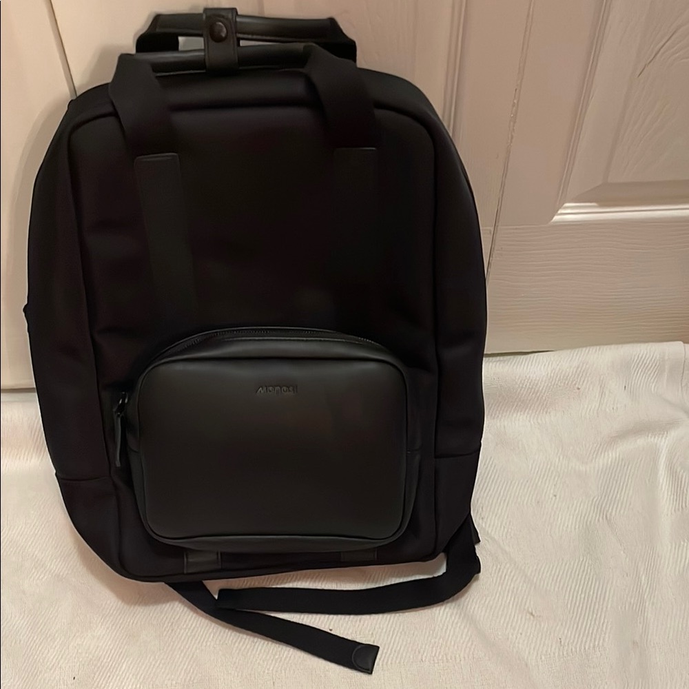 Black Backpack by monos bag pack good condition